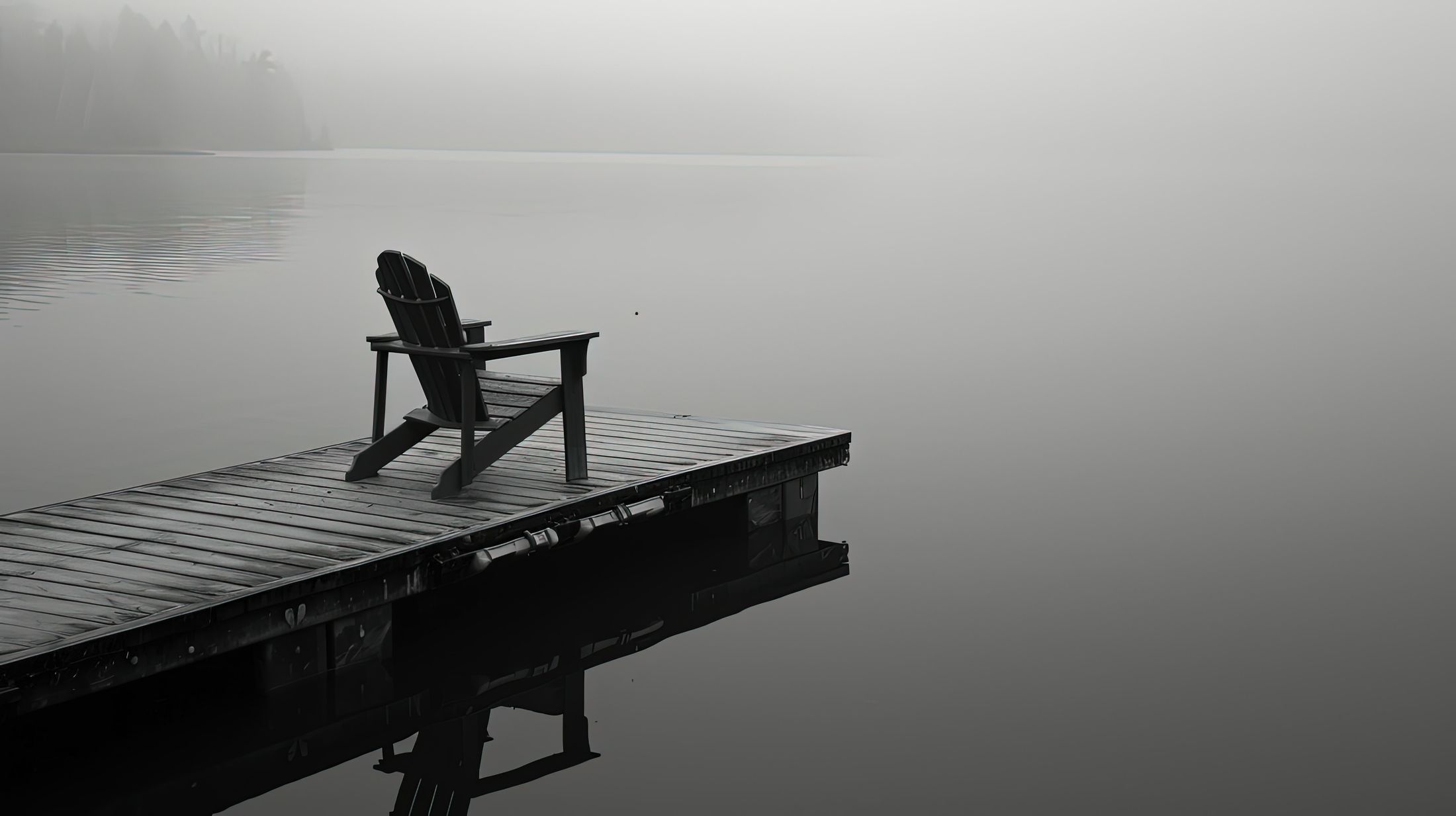A calm lake and mountains representing mental wellbeing and self-help support at Clarity Wellbeing Clinic Nuneaton